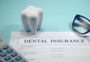 Insurance and payment options paper and tooth image