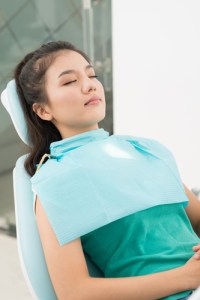 Woman in examining chair 